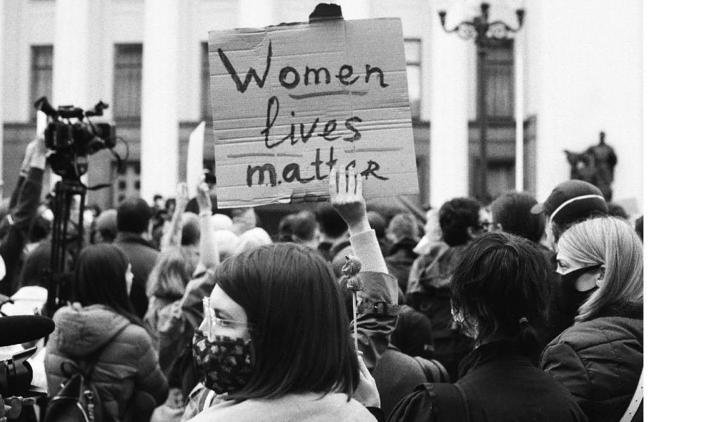 New 2 | Rules Of Abortion In Us Vs Gcc Countries | Abortion Is An Illegal Act If You Are Performing It Willfully In A Liberal Country Like The Us. Similarly, The Same Rule Is Executed In All Gcc Countries. It Might Be Possible Under Some Circumstances, Like If The Mother Or Fetus'S Life Poses A Huge Threat. A cheerful couple standing together in a beautiful setting, symbolizing love and happiness on their wedding day. The image captures joyful moments of celebration with guests around them, showcasing various wedding elements such as decorations and cake, all set against the backdrop of stunning Dubai architecture.