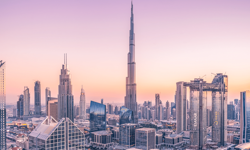 0Fde054A | 2023 New Uae Law Changes In Civil Marriage, Divorce, And Child Custody | As Of February 1, 2023, The Uae (United Arab Emirates) Will Be Implementing Reforms To The Federal Personal Status Law, Affecting The Legal System For Non-Muslim Expatriates Regarding Marriage, Divorce, Child Custody, And Inheritance. The image features the breathtaking skyline of Dubai at sunset with the famous Burj Khalifa glowing against a pastel sky. Skyscrapers reflect warm colors while construction cranes hint at ongoing developments, showcasing a vibrant city atmosphere perfect for weddings or celebrations.